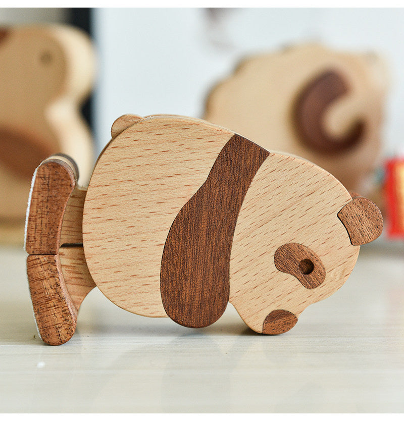 Wooden panda ramp walking toy with a blurred background