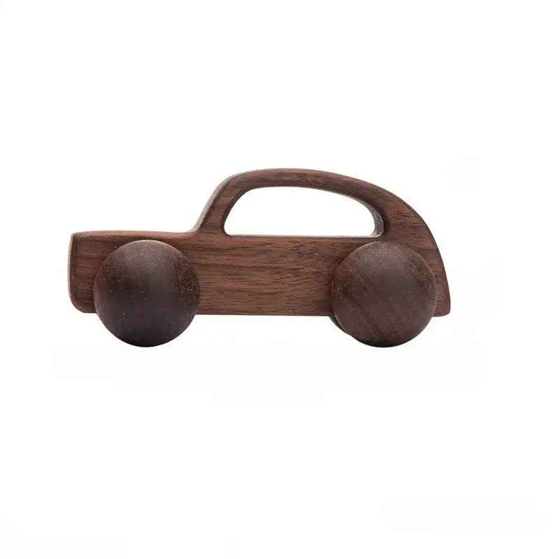 Wooden toy car with round wheels on a white background