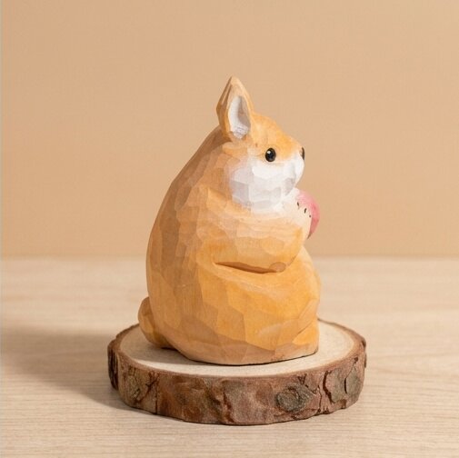 Back view hand carved wooden squirrel figurine showing tail and body details, natural wood grain finish eco-friendly toy, safe non-toxic wooden animal figurine for Montessori homeschool woodland play