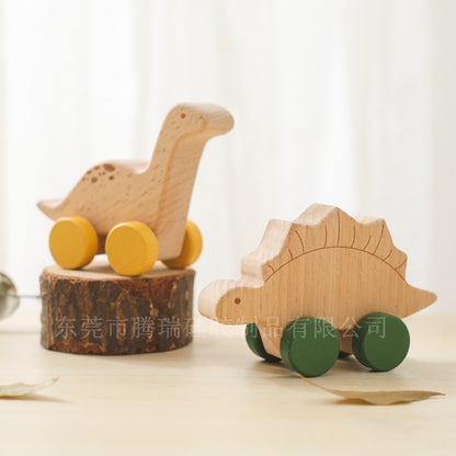 Two wooden dinosaur toys on a light background