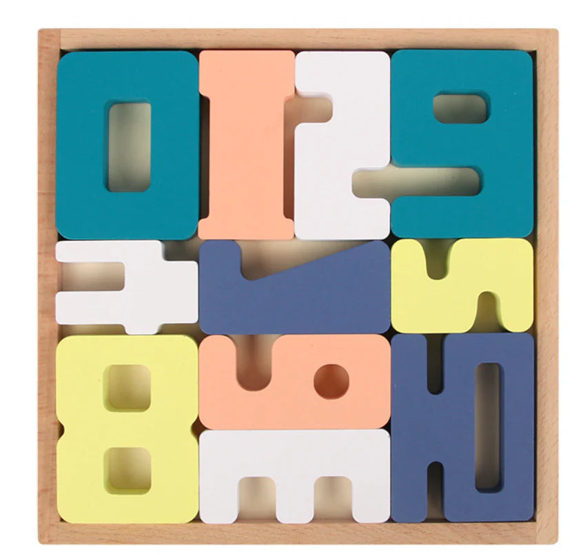 Colorful wooden letter blocks in a wooden box