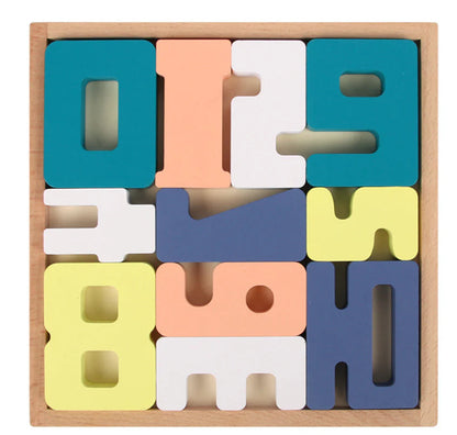 Colorful wooden letter blocks in a wooden box