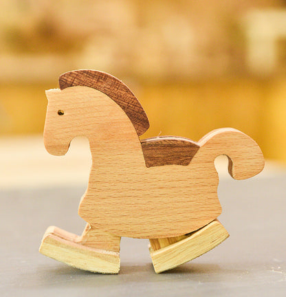 Handcrafted wooden horse ramp walker trotting down a ramp using mechanical motion