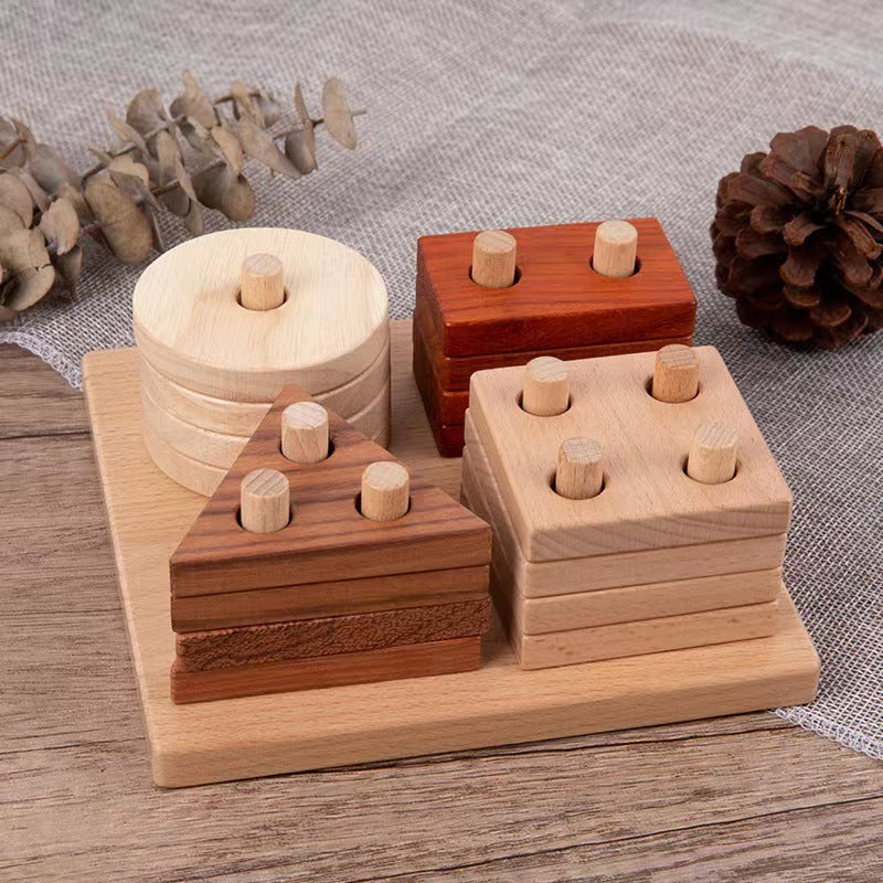Set of wooden geometric shape toys on a textured surface