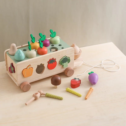 Wooden toy with colorful vegetables on a light surface