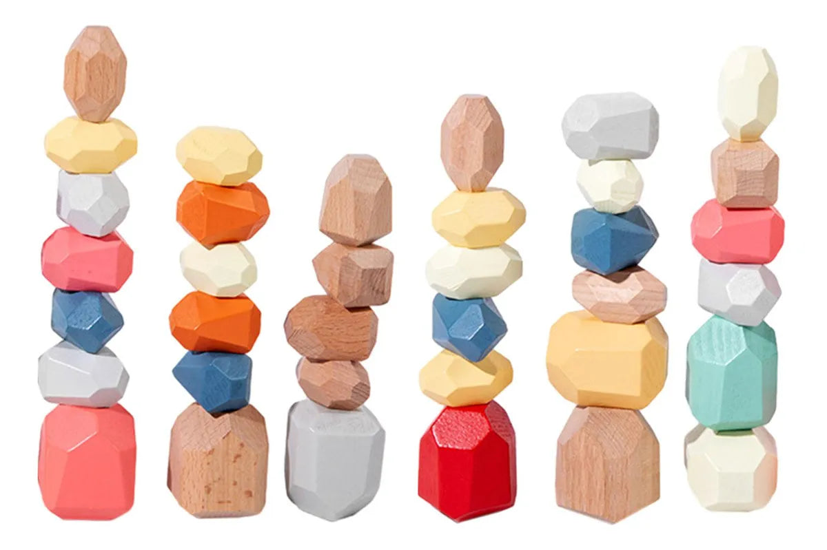 Set of colorful wooden stacking toys on a white background