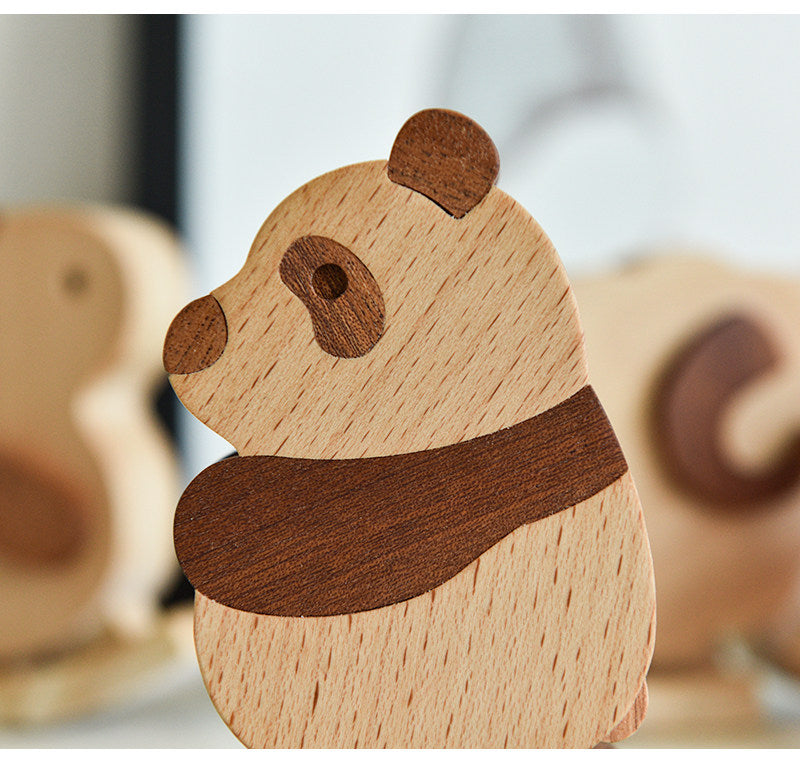 Wooden panda figurine with a blurred background