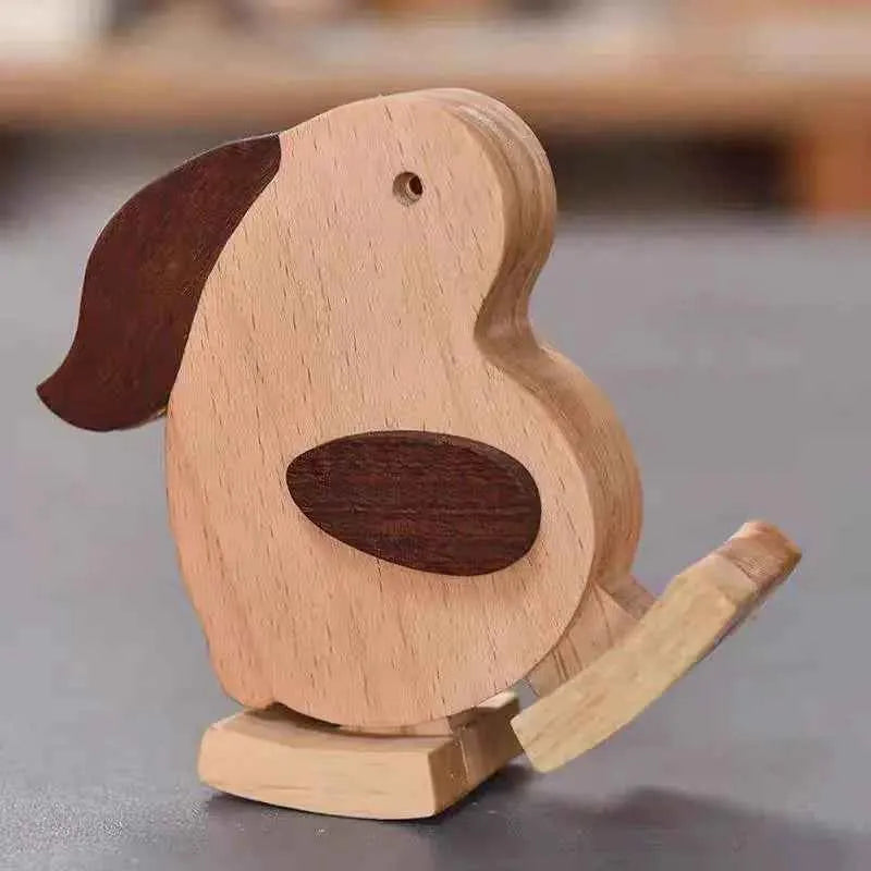 Wooden dog-shaped object on a gray surface