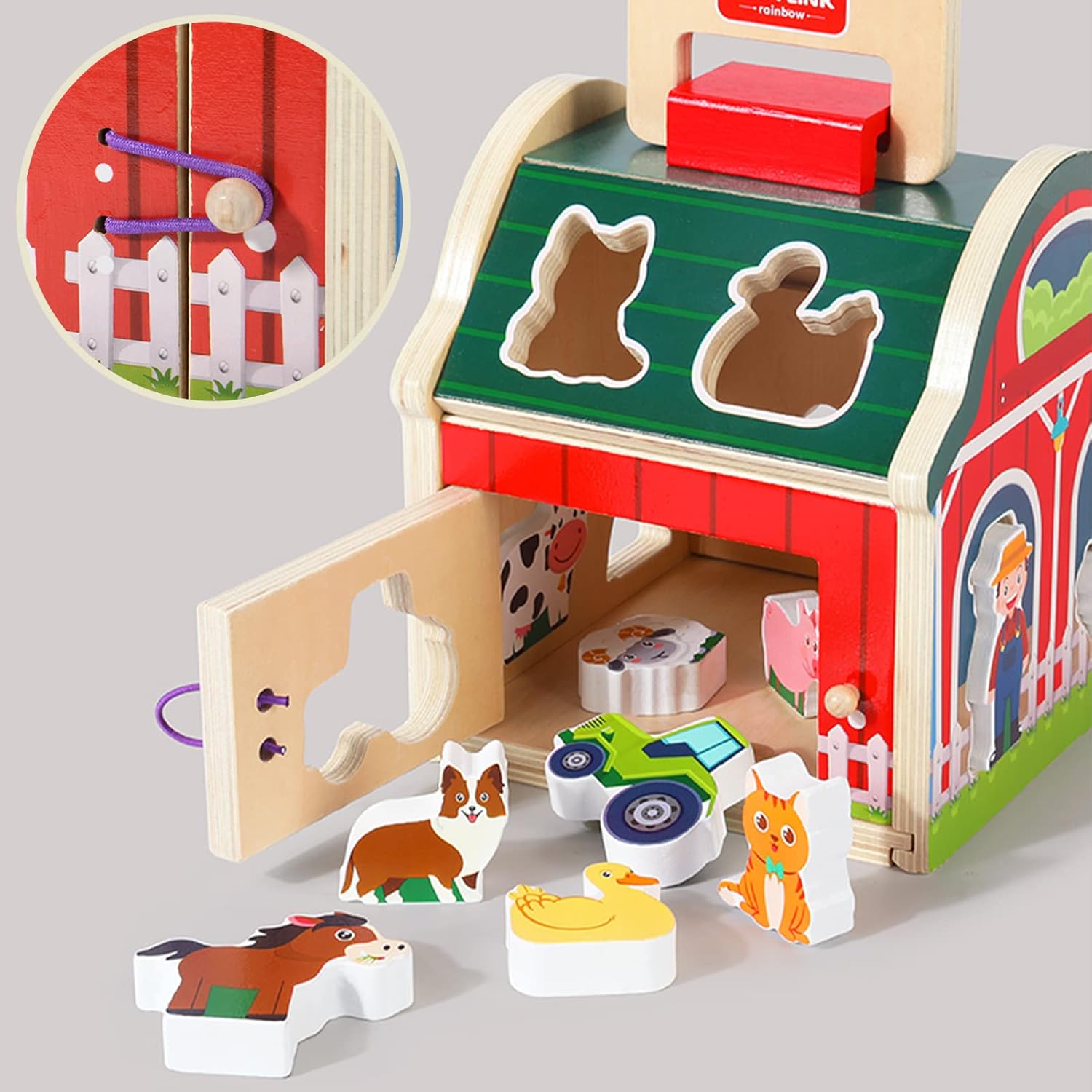 Wooden farm toy with animal shapes and a small gate, on a light gray background.