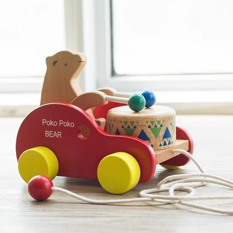 Handcrafted wooden bear drum pull toy with red, yellow wheels, eco-friendly Montessori design