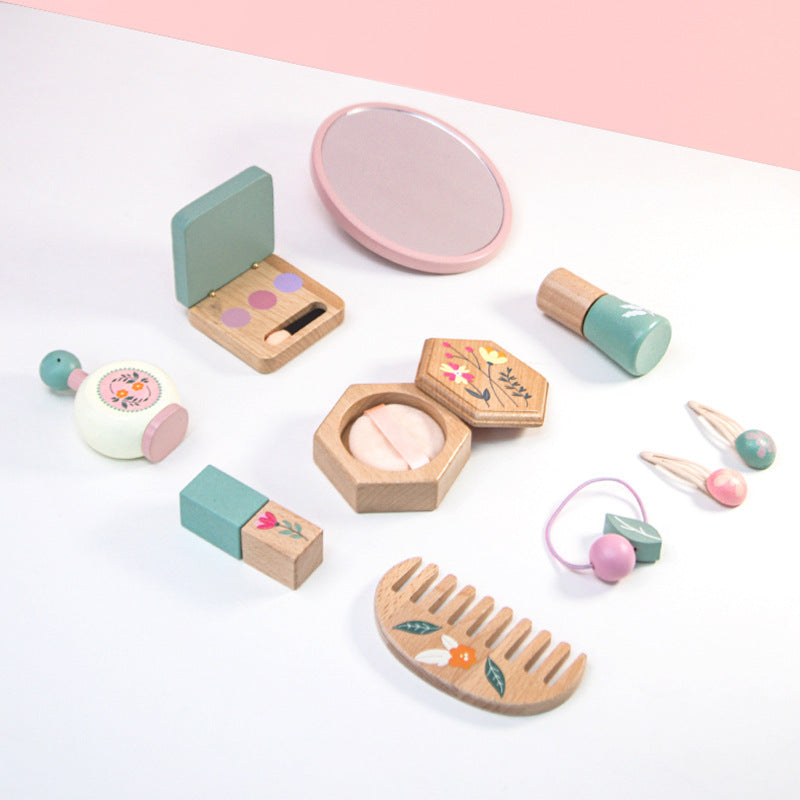 Montessori wooden kids makeup play set with comb, mirror, and pastel accessories on white table