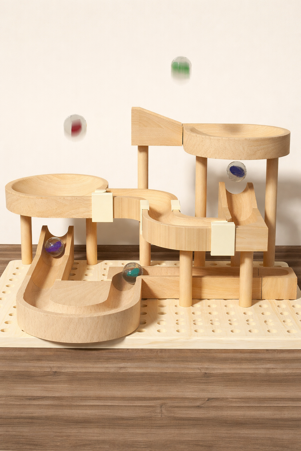 Handcrafted Montessori wooden marble run toy on wooden base with colorful marbles