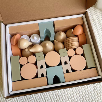 Set of wooden building blocks in a box