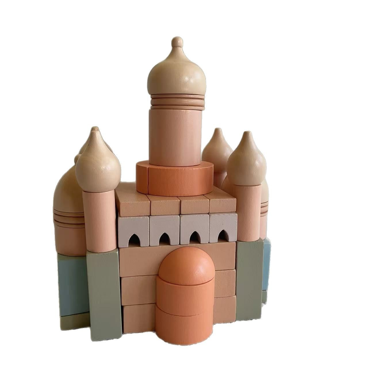 Toy castle made of interlocking bricks on a white background