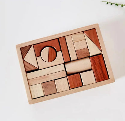 Wooden block puzzle with various shapes on a white surface