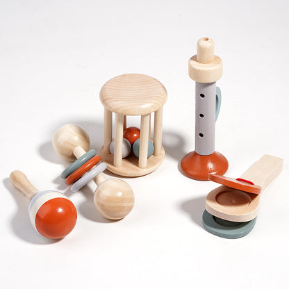 Set of wooden toys with colorful knobs on a white background