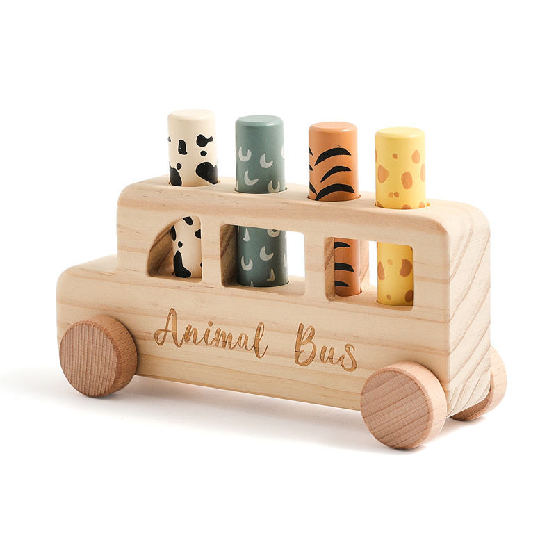 Wooden toy with animal-themed cylindrical shapes on a white background