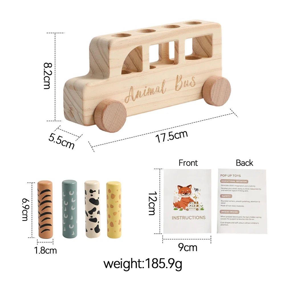 Wooden toy bus with measurements and additional toys on a white background