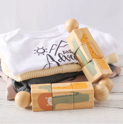 Wooden blocks with animal prints on a white surface