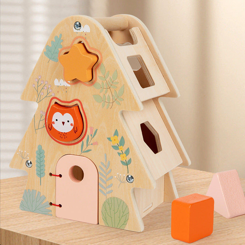 Wooden toy with animal shapes on a wooden surface