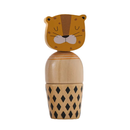 Wooden toy figure with a lion design on a white background