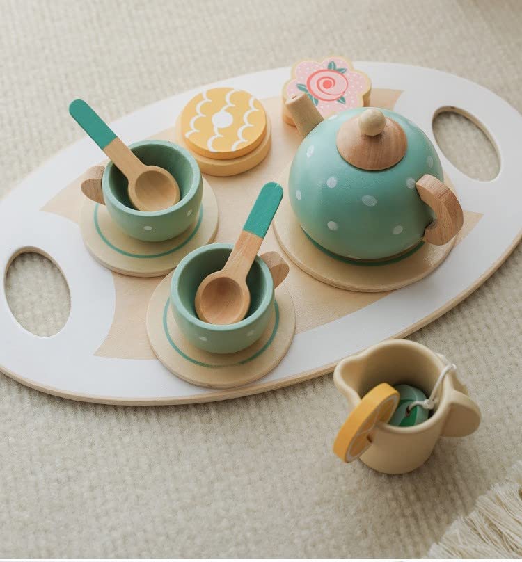 Children's toy tea set with cups, saucers, teapot, and cookies on a wooden tray.