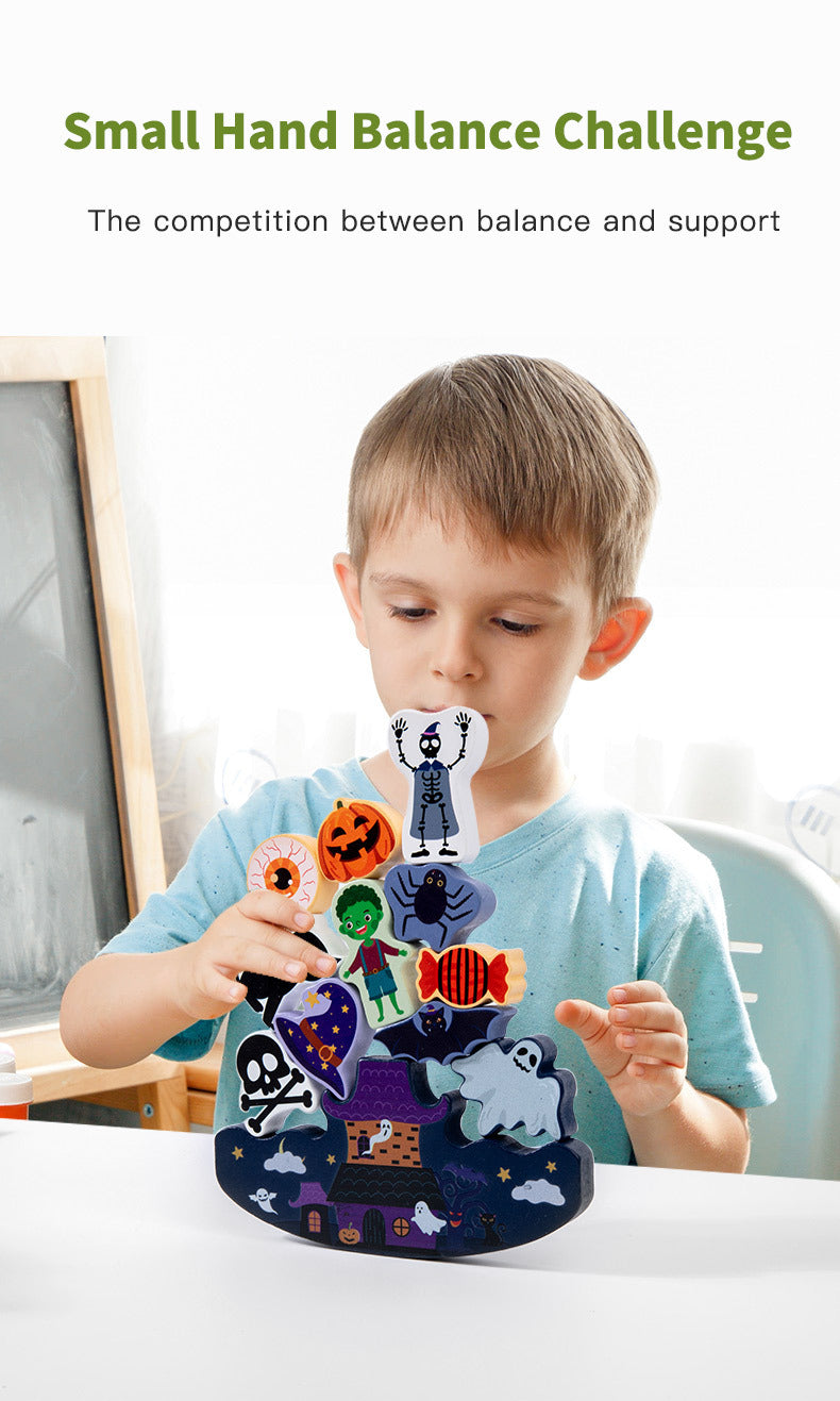 Child playing with a small hand balance challenge toy at a table.