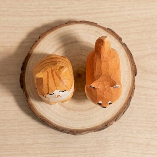 Back view hand carved wooden pet figurine showing tail and body details, natural wood grain finish eco-friendly toy, safe non-toxic wooden animal figurine for Montessori homeschool play