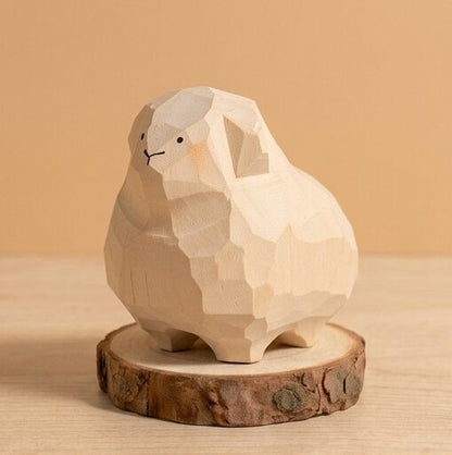 Side view handcrafted wooden sheep rabbit figurine showing carved details, sustainable natural wood toy safe for kids 18 months+, eco-friendly farm animal toy for nursery decor