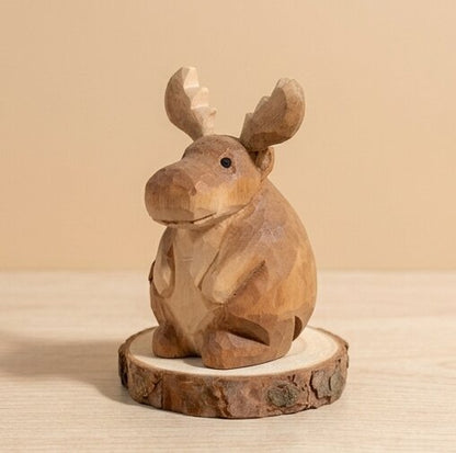 Top detail view wooden moose figurine toy showing hand carved texture and antlers, non-toxic stained natural wood eco-friendly figurine, sustainable wooden animal toy gift for children ages 1-5 years