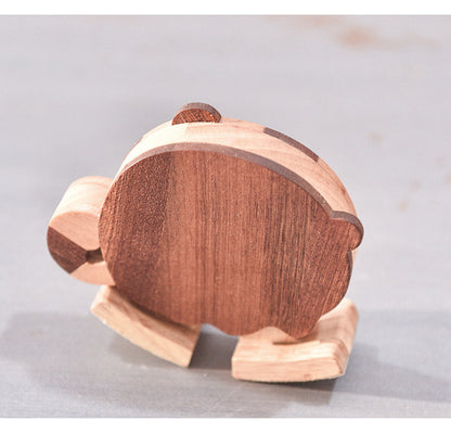 Back view of a handcrafted wooden tiger ramp walker toy showing natural wood grain and contrasting hardwood details.