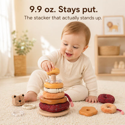 10 month old baby stacking Lion Wooden Stacker on wooden floor, 9.9 oz solid beech wood stays put