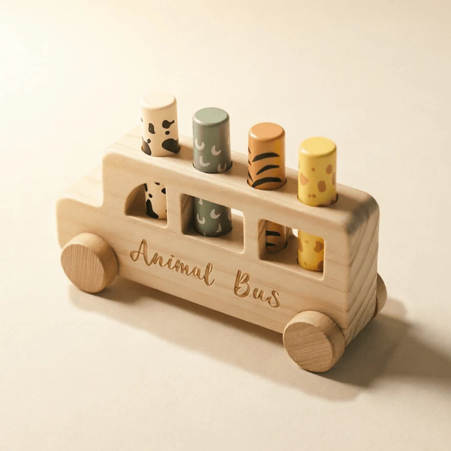 top-down view of wooden pop-up animal bus showing four animal slots and natural wood finishcarriage