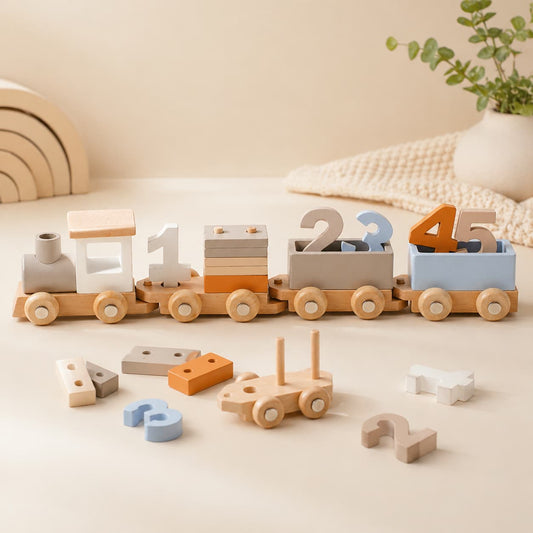 A Montessori wooden number train toy set for toddlers featuring a neutral-toned locomotive and carriages with chunky number blocks 1-5, designed to support early counting, math learning, and fine motor skills.