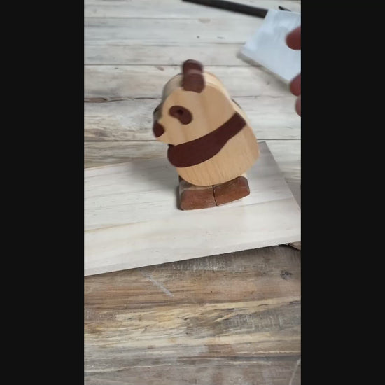 panda ramp walker is walking on a wooden board