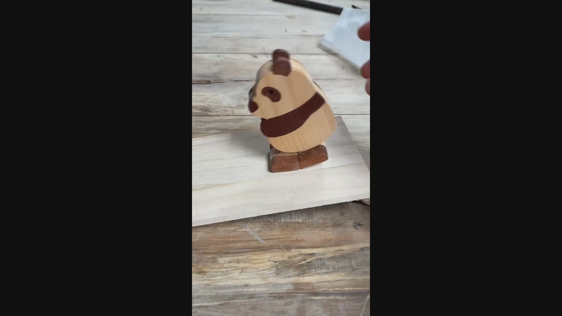 panda ramp walker is walking on a wooden board