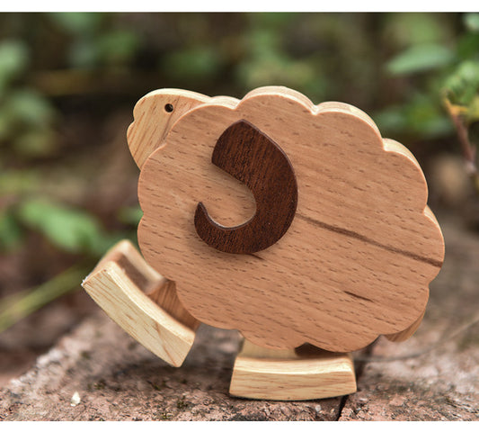 Kinetic walking sheep ramp walker ambling down a ramp for nursery decor.