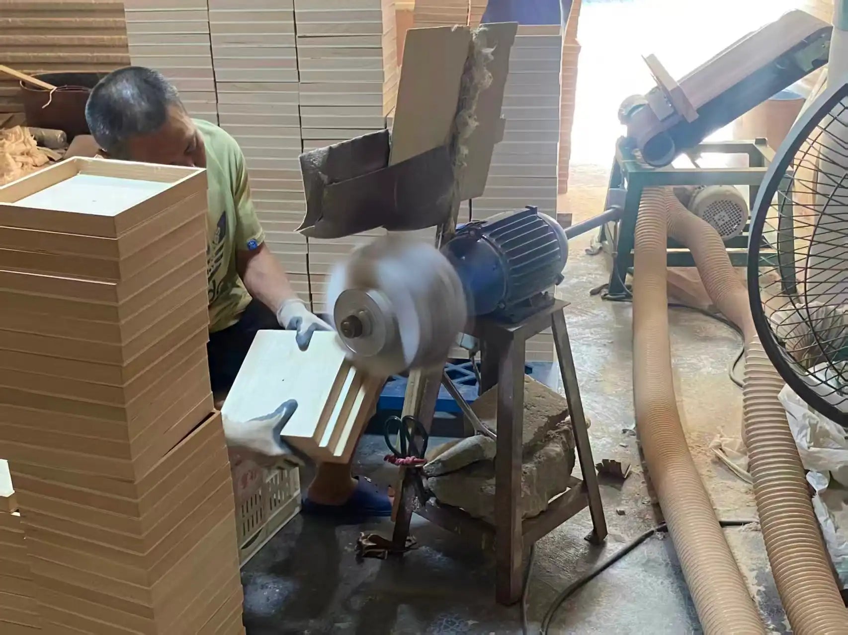 Industrial sanding machine ensuring smooth finish on custom wooden toys, quality-controlled B2B manufacturing