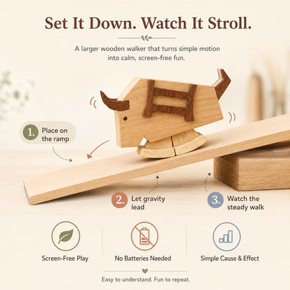 A step-by-step infographic showing how to set down a large wooden bull ramp walker toy and watch it stroll, promoting battery-free cause and effect play.