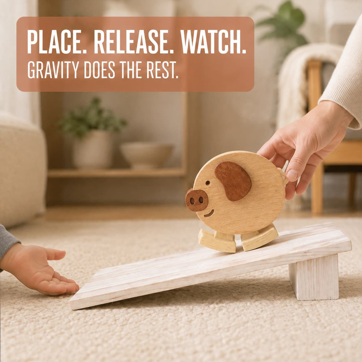 Adult placing a wooden pig ramp walker toy at the top of a wooden ramp for gravity-powered play.
