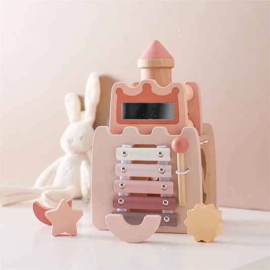 Wooden toy with pink and beige colors on a light background